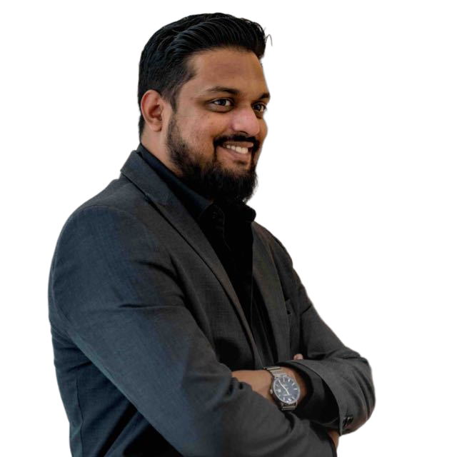 Abrar Khan in a warm color-graded transparent portrait, smiling with his arms crossed